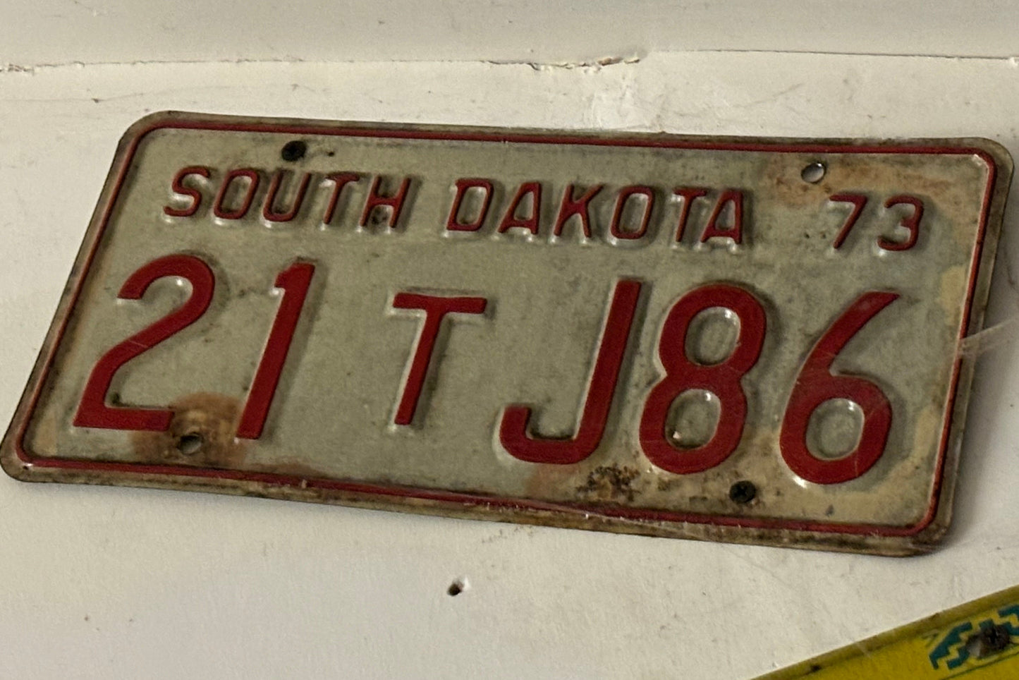 21 T J86 South Dakota License Plate